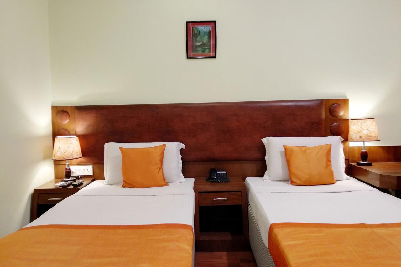 Oyo 6110 Thalassa Suites Bangalore Eksteriør bilde